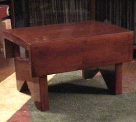 A wooden footstool/stepstool